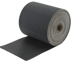 A roll of black industrial foam with a portion unrolled on a white background.