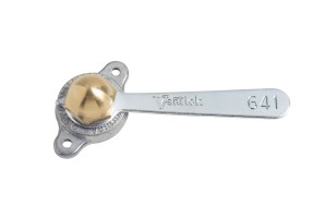 A silver tuning fork with a gold-colored weighted ball on the handle, marked with the word "fact" and the number 641 HIVEL VENTLOK SELF-LOCKING REGULATOR FOR 1/2″.