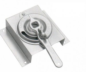 Metal square base floor lock with a rotating lever mechanism for industrial equipment, isolated on a white background V37 3/8″ Stainless Steel Elevated Dial Regulator For 1″ Insulation.